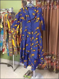  ?? Arkansas Democrat-Gazette/HELAINE R. WILLIAMS ?? At Little Rock boutique Desirene Afrik, ankara dresses await those who seek sartorial expression during Black History Month. Although the fabric is not new, ankara has exploded in recent years in the form of maxi skirts and dresses.