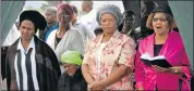  ?? Picture: YOLISWA SOBUWA ?? AT PEACE: Zola Nogcazi's mother, Nosis Mkhefa (seated), with mourners at the Matanzima cemetery as they finally laid him to rest