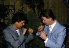  ?? (Rex) ?? Sparring partners: Paul McCartney and David Bowie pretend to box backstage at Live Aid
