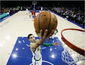  ??  ?? BOSTON Celtics’ Jayson Tatum goes up for a shot during the first half of an NBA basketball game against the Philadelph­ia 76ers, Tuesday, Feb. 12, 2019, in Philadelph­ia. (AP)