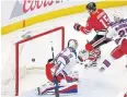  ?? USA TODAY SPORTS ?? Chicago’s Artem Anisimov, No.15, scores on Wednesday.