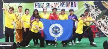  ??  ?? UCTS wushu team with the organising chairman-cum-coach Ling Kwong Leong (back row, standing sixth left).