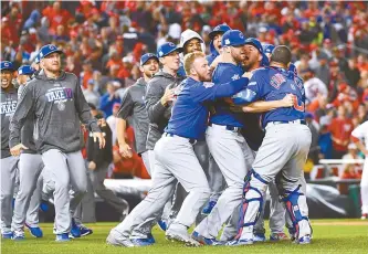  ?? USA Today-Yonhap ?? The Chicago Cubs celebrate after defeating the Washington Nationals in Game 5 of the 2017 NLDS playoff baseball series at Nationals Park, Thursday.