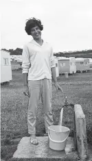  ?? (Mirrorpix) ?? A happy camper despite the basic facilities at an Exmouth caravan site in 1961. Marion recalls very similar holidays.