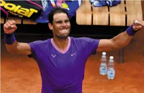  ?? —AFP ?? Vengeance is sweet: Spain’s Rafael nadal celebrates after winning his match against Germany’s alexander Zverev at the Italian Open on Friday.