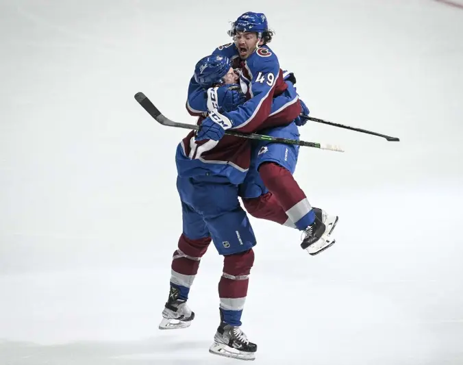  ?? Aaron Ontiveroz, The Denver Post ?? Colorado’s Josh Manson, left, celebrates his game-winning goal with teammate Samuel Girard in overtime of Colorado’s 3-2 win at Ball Arena on Tuesday night. The Avalanche took a 1-0 lead in the best-of-seven conference semifinal series.