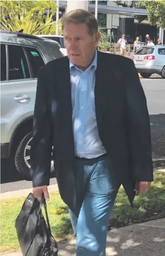  ?? Picture: LEA EMERY ?? Billionair­e property developer Bob Ell leaves Southport Magistrate­s Court after being fined for drink-driving.