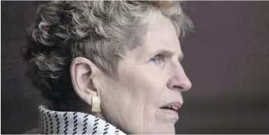  ?? CHRIS YOUNG, THE CANADIAN PRESS ?? Ontario Premier Kathleen Wynne: “We’ve got to pay attention to the reality of women’s lives.”