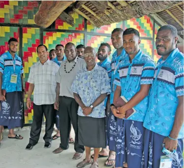 ?? Photo: Peni Komaisavai ?? Vanuatu Lands Minister Ralph Regenvanu (left) and Chief Isaac Woroworo (middle) pose with the Team Fiji men’s football team after the church service in Port Vila, Vanuatu, on December 3, 2017.