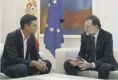  ??  ?? 0 Spanish Socialist Party Pedro Sanchez, left, met prime minister Mariano Rajoy for talks on the Catalonia referendum crisis