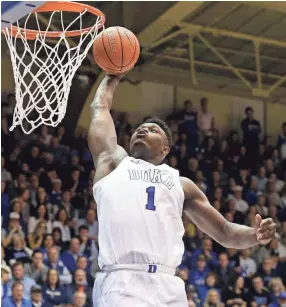  ??  ?? Duke’s Zion Williamson goes to the basket against Virginia on Jan. 19 in Durham, N.C. The freshman forward has been a star for the Blue Devils. GERRY BROOME/AP