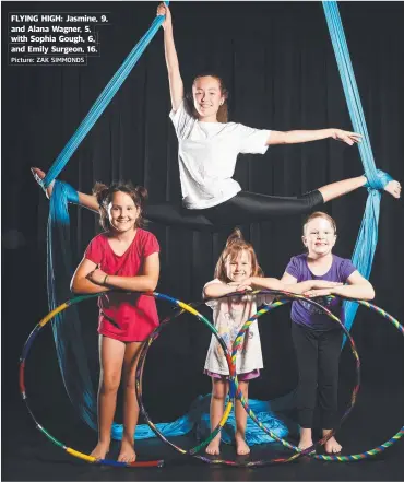  ?? Picture: ZAK SIMMONDS ?? FLYING HIGH: Jasmine, 9, and Alana Wagner, 5, with Sophia p Gough, g 6, and Emily Surgeon, 16.