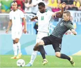  ?? Photo: REUTERS ?? John Obi Mikel (10) of Nigeria of Nigeria and Lars Bender (GER) of Germany fight for the ball during the first half of the men's football semi-final match.