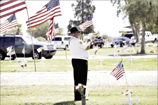  ?? FILE PHOTO ?? MEMORIAL DAY SERVICES TAKE PLACE AT DESERT LAWN IN YUMA. Yumans will again honor the sacrifices of U.S. veterans on Monday.