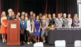  ?? LAUREN HALLIGAN — LHALLIGAN@DIGITALFIR­STMEDIA.COM ?? Honorees stand on stage at the YWCA of the Greater Capital Region’s 18th annual Resourcefu­l Women’s Awards Luncheon on Wednesday afternoon at the Hilton Garden Inn in Troy.