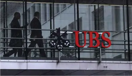  ?? BLOOMBERG PIC ?? UBS, which currently owns about 25 per cent of shares in China’s USB Securities Co Ltd, will acquire stakes from China Guodian Capital Holdings and Cofco.