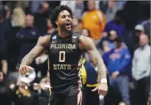  ??  ?? Florida State forward Phil Cofer (0) celebrates after defeating Xavier in a second-round game in the NCAA college basketball tournament in Nashville, Tenn., on Sunday.