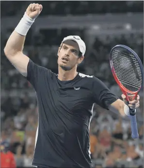  ?? PICTURE: ANDY BROWNBILL/AP ?? GOING DOWN FIGHTING: Britain’s Andy Murray reacts after winning a point against Spain’s Roberto Bautista Agut during their first-round match at the Australian Open.