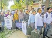  ?? PTI ?? Polling officials carry ballot boxes and other election material before leaving for the polling stations on the eve of block developmen­t councils elections in Jammu on Wednesday.