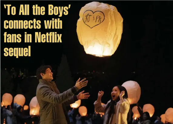  ??  ?? HEARTS ALIGHT: Peter (Noah Centineo) and Lara Jean (Lana Condor) send a balloon aloft in ‘To All The Boys: P.S. I Still Love You,’