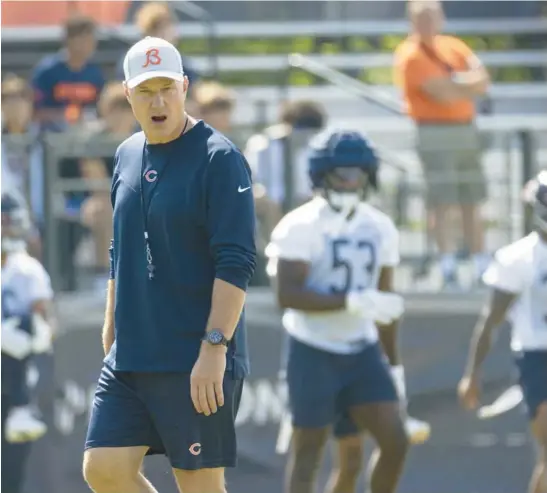  ?? BRIAN CASSELLA/CHICAGO TRIBUNE PHOTOS ?? Bears coach Matt Eberflus watches the team’s first training camp practice Wednesday at Halas Hall in Lake Forest.