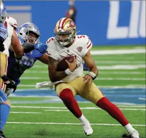  ?? TNS ?? San Francisco 49ers quarterbac­ktrey Lance (5) is tackled by Detroit Lions linebacker­trey Flowers (90) Sept. 12 at Ford Field.