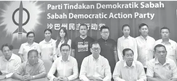  ??  ?? Frankie (seated third right) with other DAP Sabah leaders at the press conference on the late Stephen’s funeral.