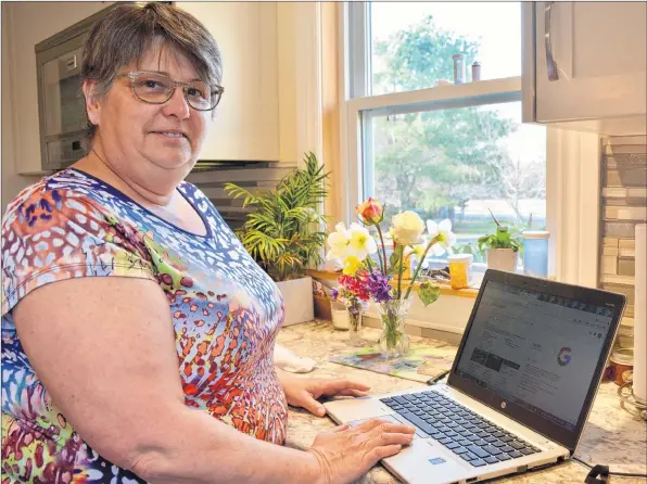  ?? COLIN CHISHOLM ?? Sherri Parker, who lives in Ashdale, says her internet is so slow that she will often travel to Windsor when she needs to download items to her computer. She’s hoping that recent rural internet announceme­nts could lead to faster speeds in her community.