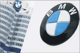  ?? THE ASSOCIATED PRESS FILE PHOTO ?? The logo of the German car manufactur­er BMW is visible at the headquarte­rs during the earnings press conference in Munich, Germany.