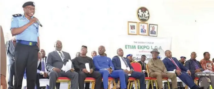  ??  ?? Akwa Ibom State governor, Chief Udom Emmanuel (3rd right), his deputy, Mr. Moses Ekpo, state Police Commission­er, Mr. Adeyemi Ogunjemilu­si (standing), addressing stakeholde­rs at the Etim Ekpo peace meeting