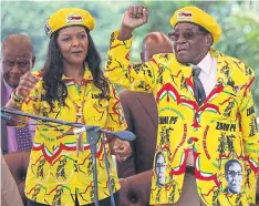  ??  ?? YELLOW PERIL: Zimbabwean President Robert Mugabe and his wife Grace arrive for a Zimbabwe African National Union supporters’ solidarity rally in Harare this month.