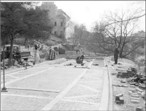  ?? Submitted photo ?? DETAILED WORK: Workers install brick pavers on the Grand Promenade.