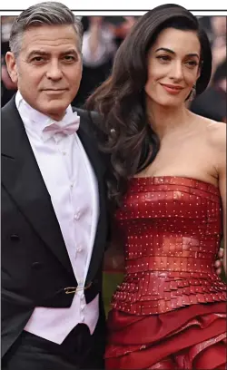  ??  ?? Beautifull­y clever: Amal Clooney with husband George