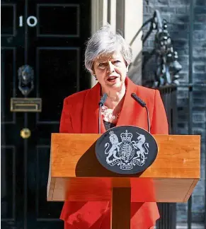  ??  ?? Official statement: May announcing her resignatio­n outside 10 Downing St in central London. — AFP