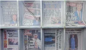  ?? Picture: ANDREW BOYERS/REUTERS ?? NATIONAL CONCERN: British newspapers reporting King Charles’ cancer diagnosis are displayed outside a newsagent in Northampto­n yesterday