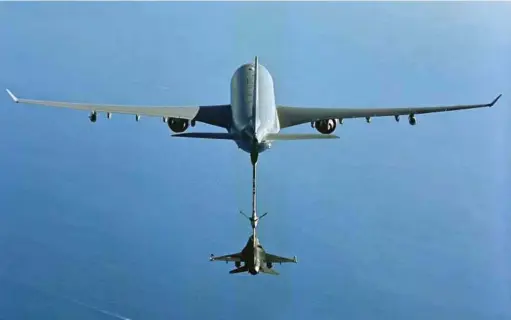  ??  ?? ONE OF THE STRONG CONTENDERS: AIRBUS A330 MRTT, SEEN HERE, REFUELLING A F-16 AIRCRAFT