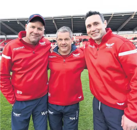  ??  ?? Wayne Pivac, Byron Hayward and Stephen Jones are pictured after their final home game with the Scarlets, the 42-0 victory over Zebre.