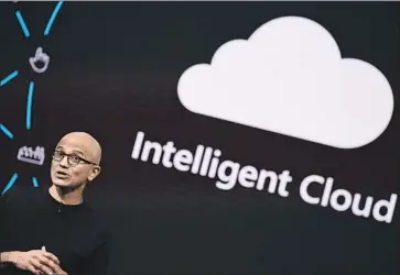 ?? GABRIEL BOUYS AFP via Getty Images ?? SATYA NADELLA took the reins at Microsoft in 2014, working to tear down silos and promoting a “growth mind-set” for workers. “Microsoft became an exciting place to work again,” an MIT professor says.