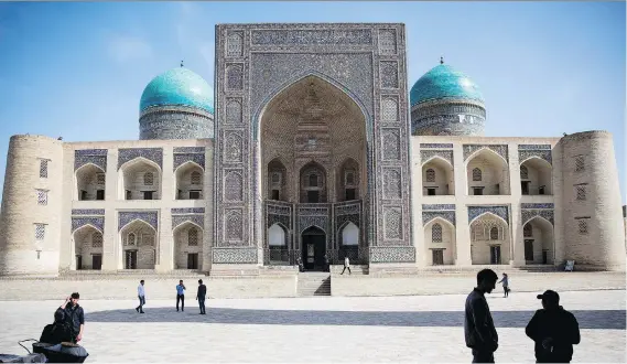  ?? PHOTOS: TAYLOR WEIDMAN/BLOOMBERG ?? The Mir-i-Arab Madrasa in Bukhara, Uzbekistan, a fantasy destinatio­n for architectu­re enthusiast­s who will revel in still-standing ancient cities.