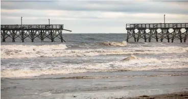  ?? JASON LEE/THE SUN NEWS VIA AP ?? The private Sea Cabins pier is seen damaged Tuesday following Isaias in North Myrtle Beach, S.C.