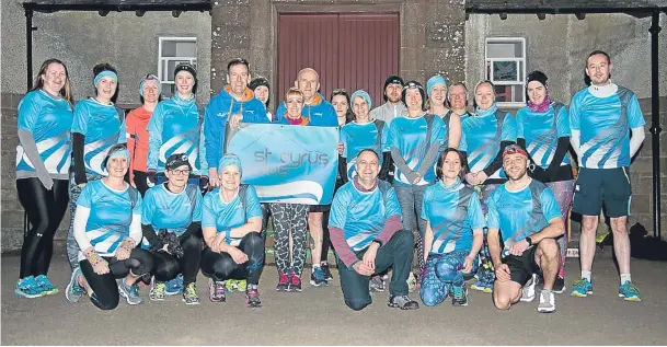  ?? Picture: Paul Smith. ?? Members of the St Cyrus Solos running club during a break from training.