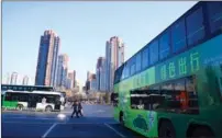  ?? PROVIDED TO CHINA DAILY ?? Electric buses operate in Beijing.