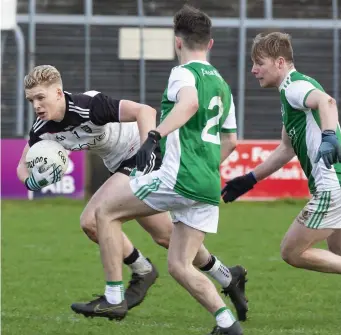  ??  ?? Red Óg Murphy, scorer of 1-4 for Sligo in action with Fermanagh in Markievicz Park. INSET: Sean Carroll. Pics: Donal Hackett.