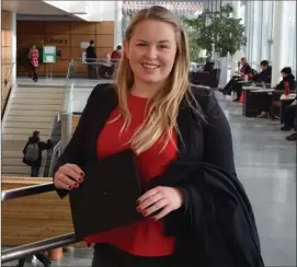  ?? Contribute­d ?? Hannah Griffin with her cap and gown in the Centre for Learning, Kelowna Campus.