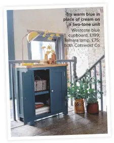  ??  ?? TRY WARM BLUE IN PLACE OF CREAM ON A TWO-TONE UNIT Westcote blue cupboard, £199; tamara lamp, £75; both Cotswold Co