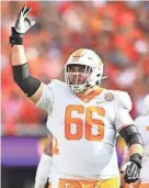  ?? BRIANNA PACIORKA/NEWS SENTINEL ?? Tennessee offensive lineman Dayne Davis celebrates on the field during the Vols’ game against Georgia on Nov. 5, 2022, in Athens, Ga.