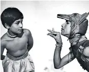  ??  ?? Mover and shaker: Khan, top, and members of English National Ballet, left, during rehearsals for new show Creature. Khan as a boy in the Adventures of Mowgli tour in 1984, above