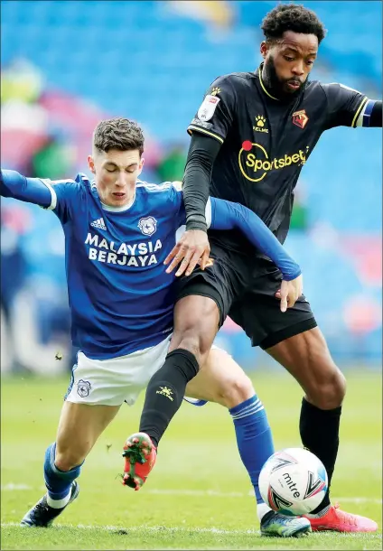  ?? PICTURE: PA Images ?? PHYSICAL: Cardiff’s Harry Wilson, left, is tackled by Watford’s Nathaniel Chalobah