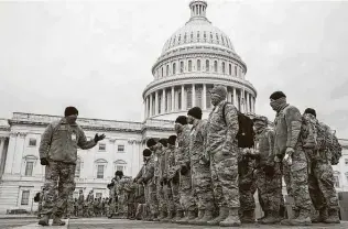  ?? Sarah Silbiger / Bloomberg ?? As many as 15,000 National Guard members will be deployed to Washington for the inaugurati­on.