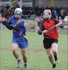  ??  ?? Josh White strikes for goal as Seán Fleming tries to block.